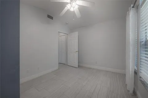 a bathroom with a shower curtain