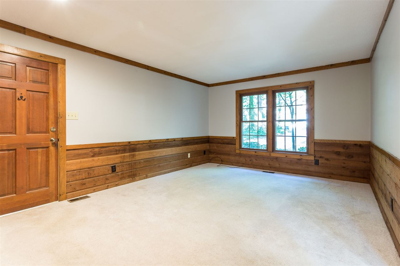 8816 Woodstone Drive Raleigh, NC 27615 - Photo 14 of 30 The hub of everything located between the garage and kitchen and access to the screen porch. Family Room