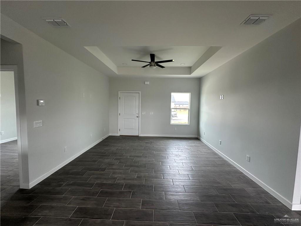 1704 Unity Drive Mercedes, TX 78570 - Photo 2 of 11 an empty room that has a window in it