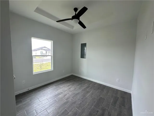 a view of an empty room and window