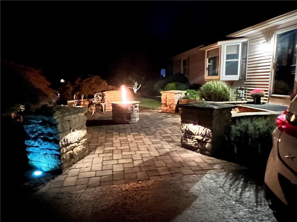 517 Old Mill Lane Webster, NY 14580 - Photo 4 of 23 Front patio at night