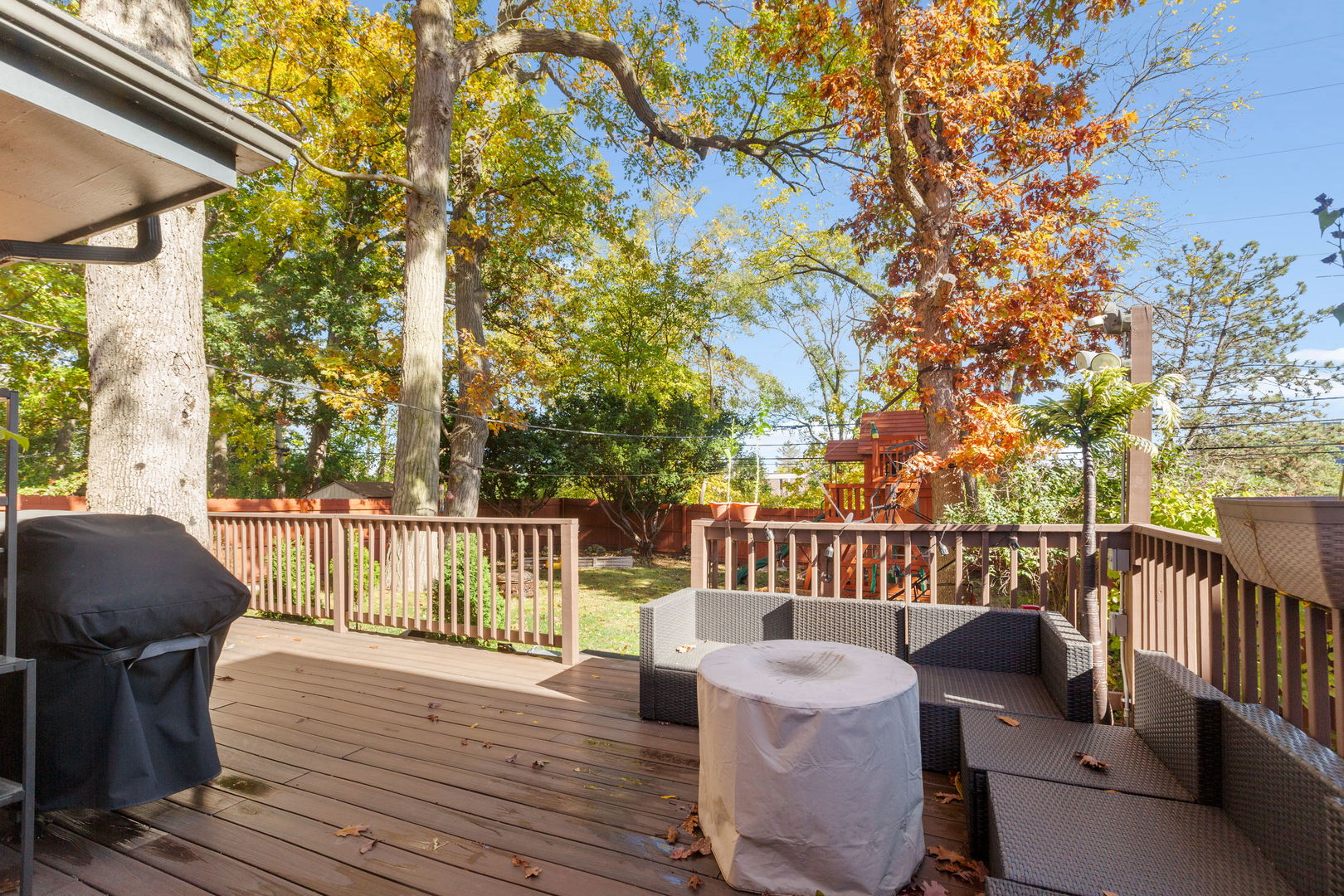 1013 Longaker Road Northbrook, IL 60062 - Photo 23 of 30 a balcony with wooden floor table and chairs