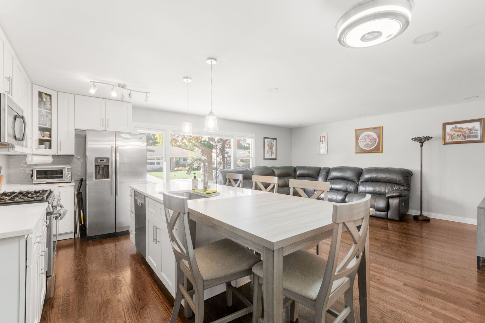1013 Longaker Road Northbrook, IL 60062 - Photo 5 of 30 a large kitchen with a table and chairs