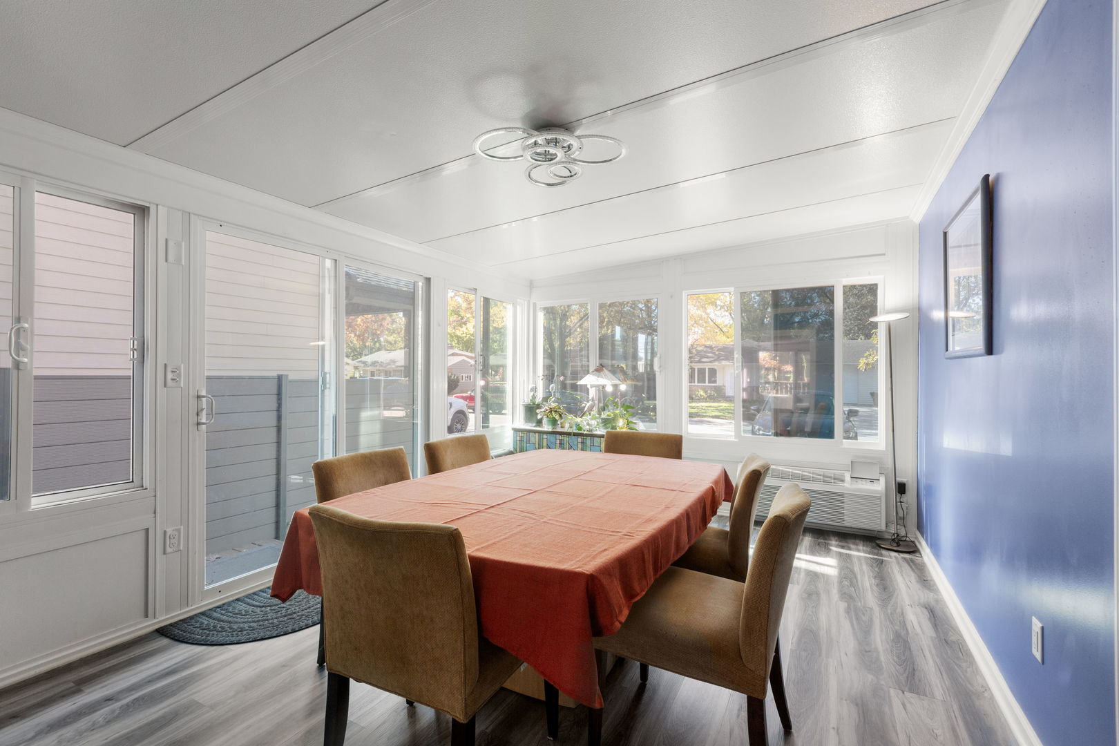 1013 Longaker Road Northbrook, IL 60062 - Photo 7 of 30 a view of a dining room with furniture wooden floor and chandelier