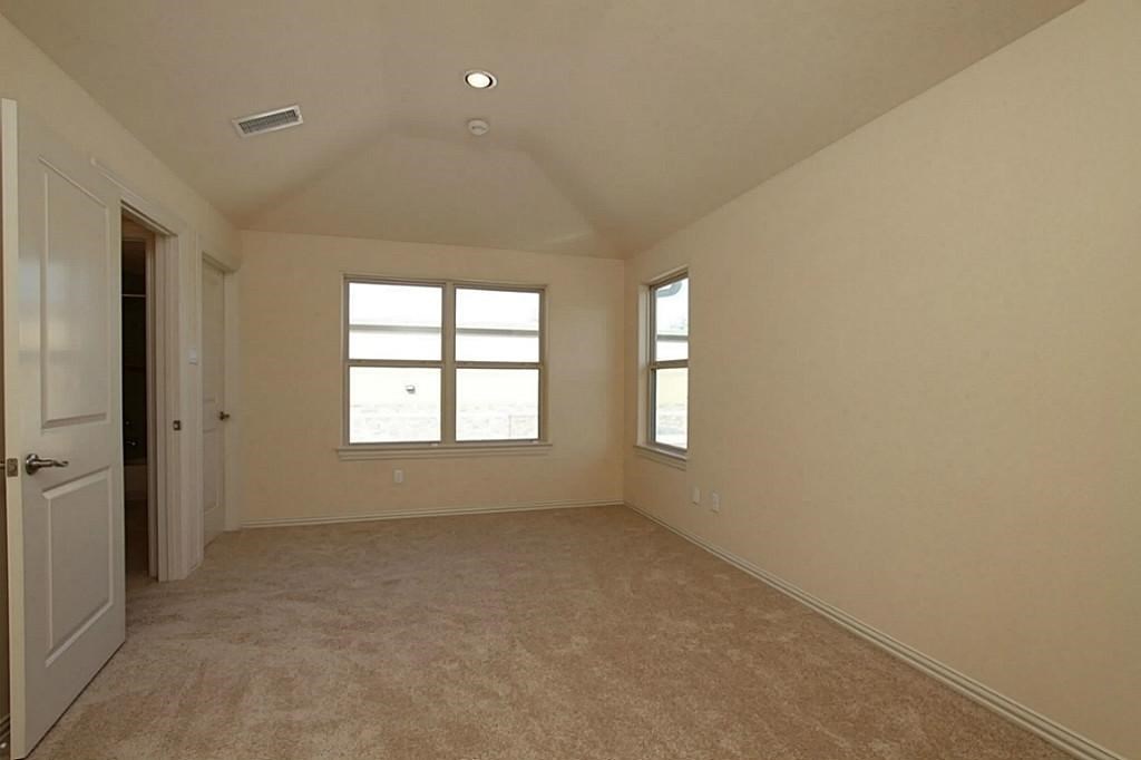 14478 Summerleaf Lane Houston, TX 77077 - Photo 13 of 26 an empty room with windows