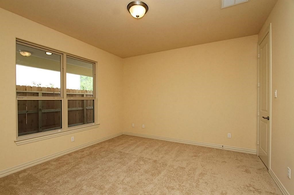 14478 Summerleaf Lane Houston, TX 77077 - Photo 14 of 26 an empty room with a window