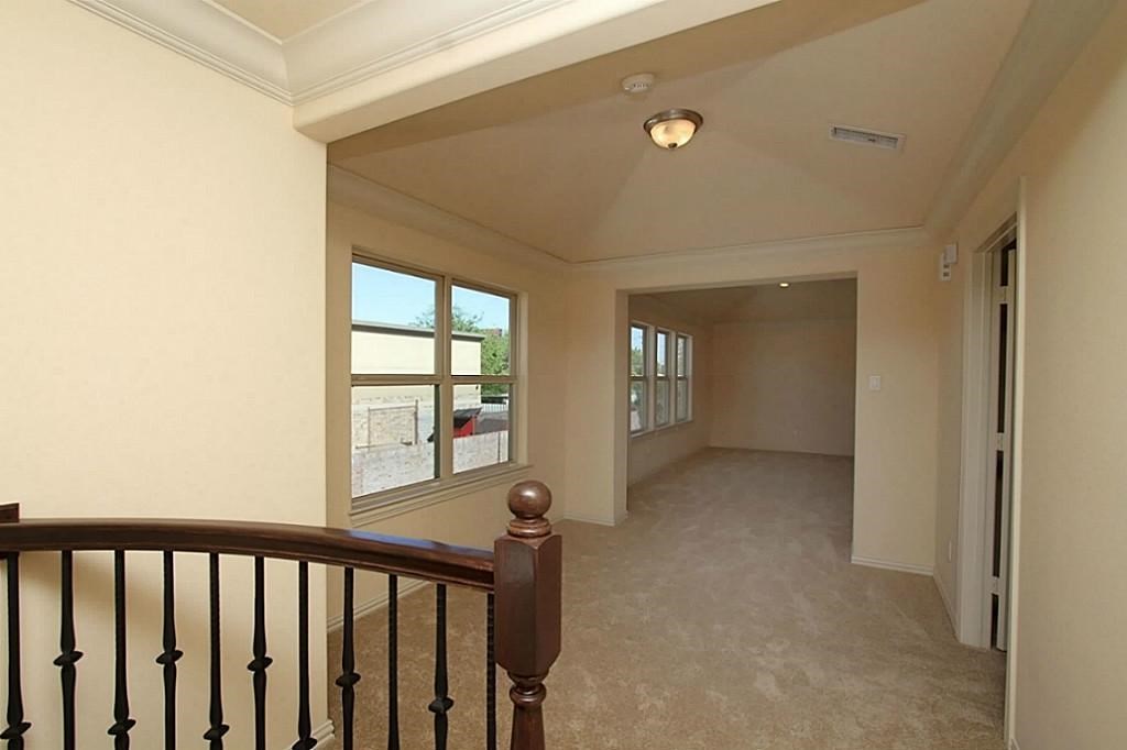 14478 Summerleaf Lane Houston, TX 77077 - Photo 20 of 26 a view of a hallway with windows