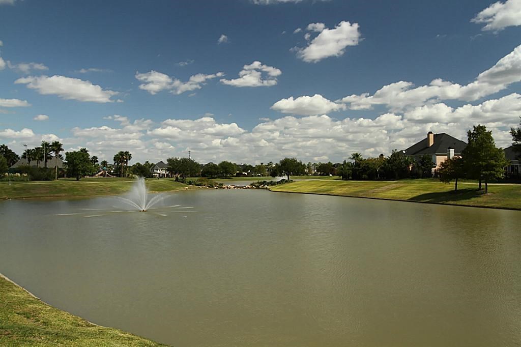 14478 Summerleaf Lane Houston, TX 77077 - Photo 23 of 26 a view of a lake with houses in the background