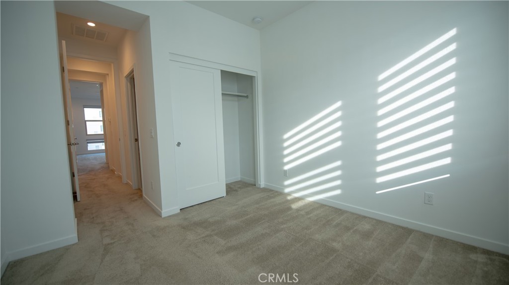 339 Placemark Irvine, CA 92614 - Photo 13 of 30 an empty room with windows