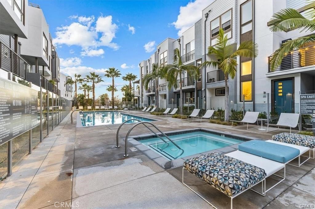 339 Placemark Irvine, CA 92614 - Photo 24 of 30 a view of a building with a swimming pool