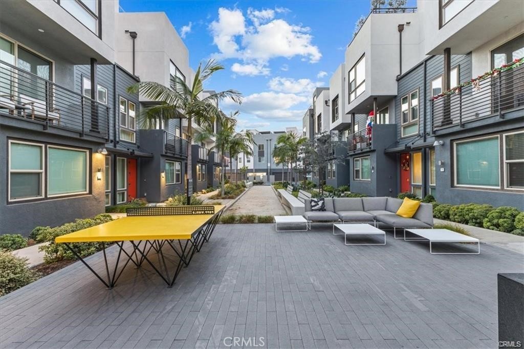 339 Placemark Irvine, CA 92614 - Photo 26 of 30 a view of a patio with swimming pool table and chairs