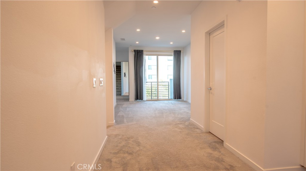 339 Placemark Irvine, CA 92614 - Photo 4 of 30 a view of hallway with windows