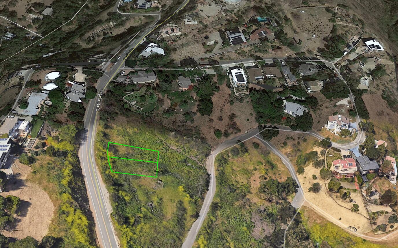 Latigo Cyn Road Malibu, CA 90265 - Photo 18 of 20 a aerial view of a house with a yard