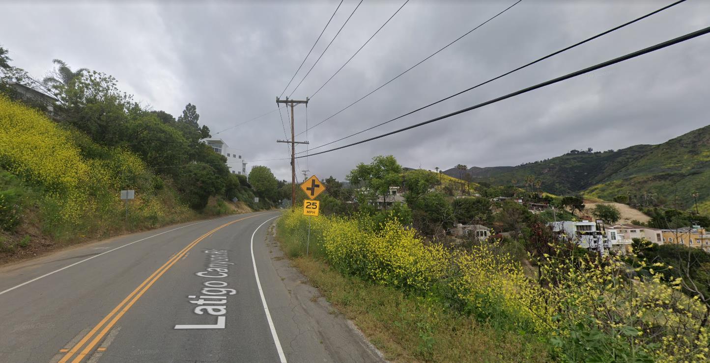 Latigo Cyn Road Malibu, CA 90265 - Photo 3 of 20 a view of a city street with a building in the background