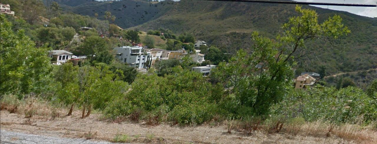 Latigo Cyn Road Malibu, CA 90265 - Photo 5 of 20 an aerial view of residential house with outdoor space and trees all around