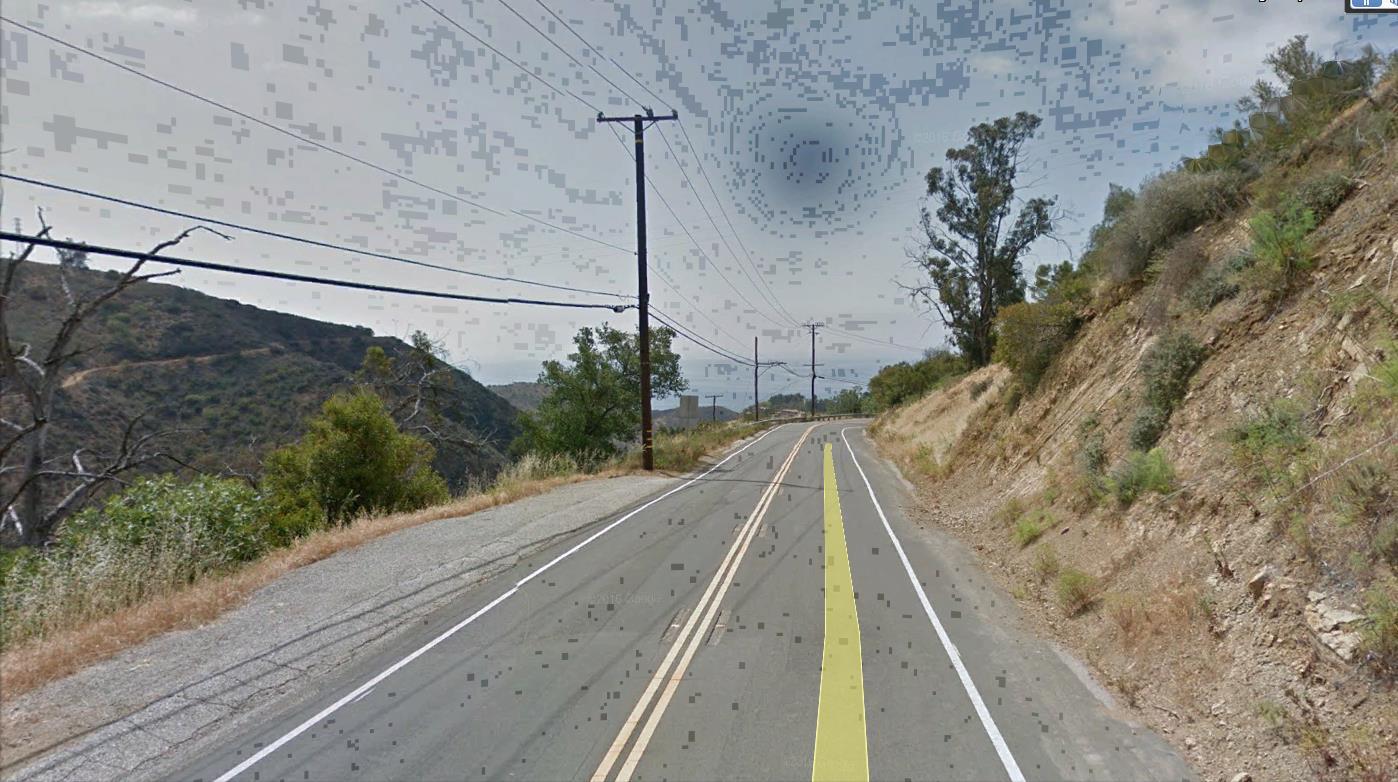 Latigo Cyn Road Malibu, CA 90265 - Photo 9 of 20 a view of a balcony with a street