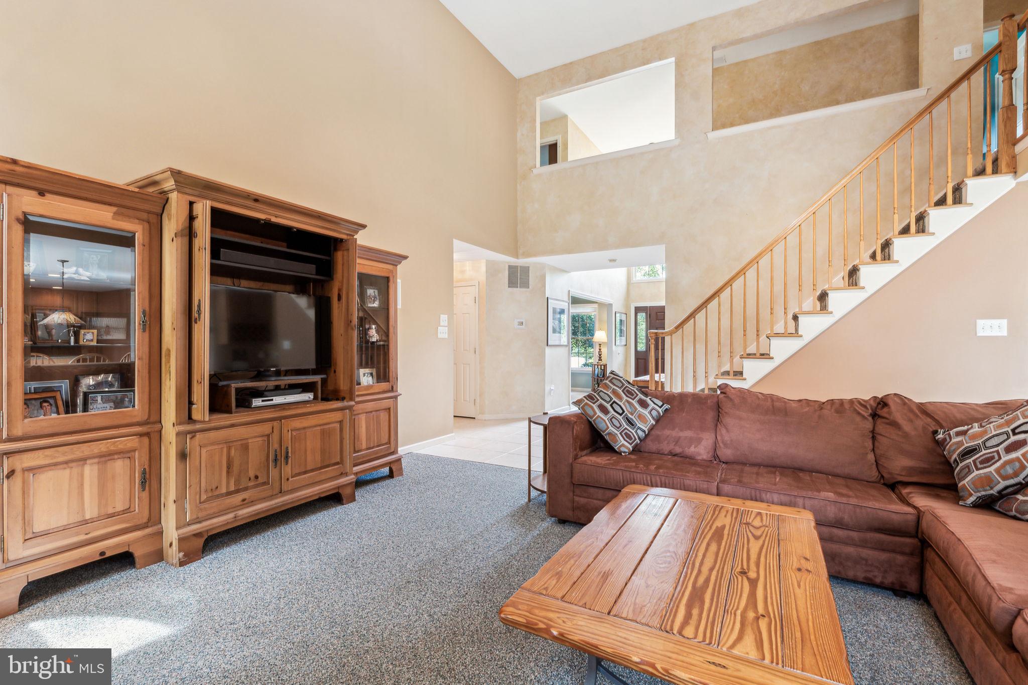 22 Devonshire Drive Voorhees, NJ 08043 - Photo 12 of 54 a living room with furniture and a flat screen tv