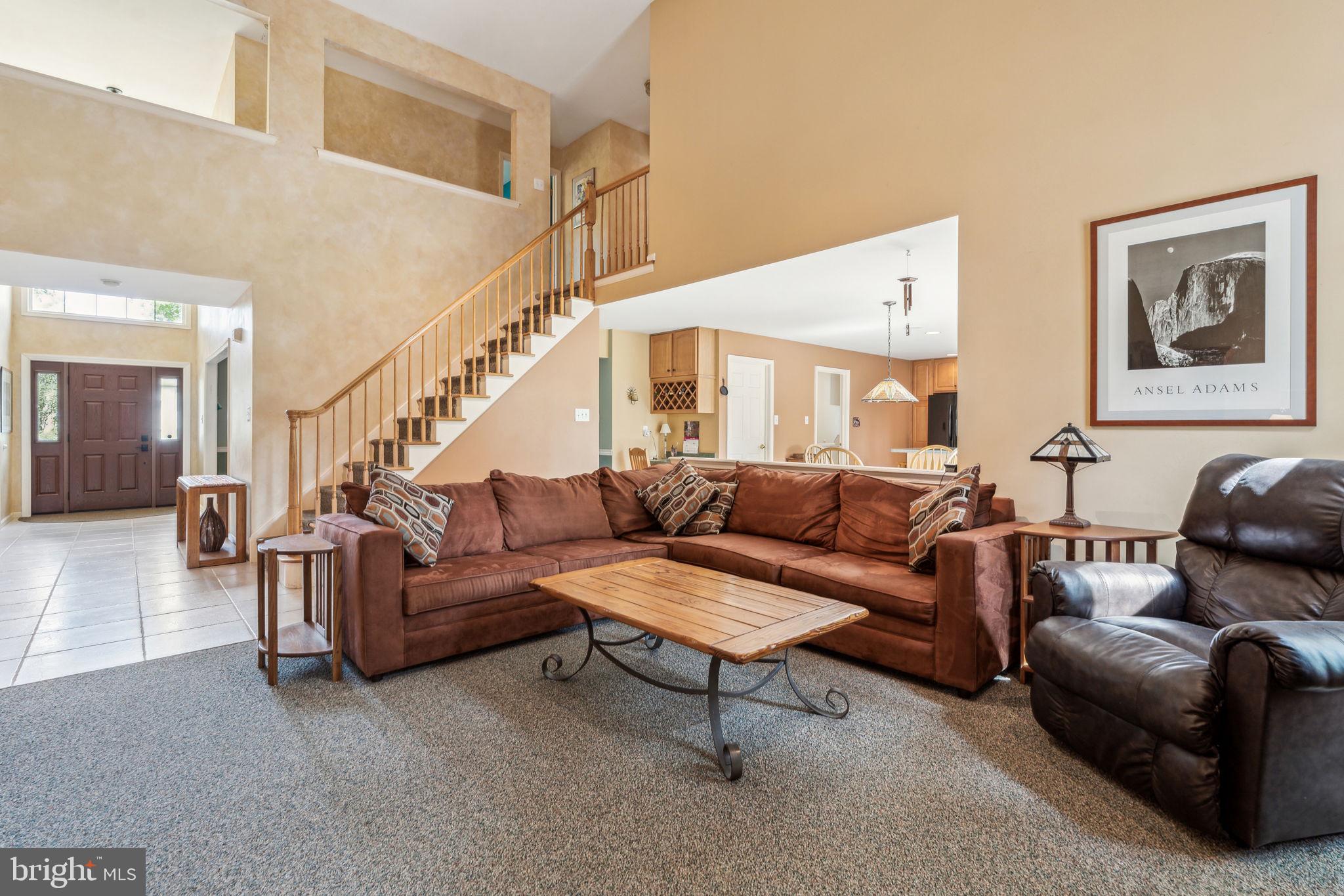 22 Devonshire Drive Voorhees, NJ 08043 - Photo 13 of 54 a living room with furniture and a potted plant