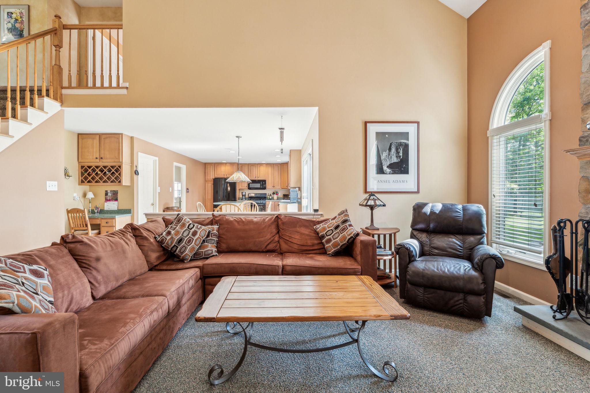 22 Devonshire Drive Voorhees, NJ 08043 - Photo 15 of 54 a living room with furniture a rug and a large window