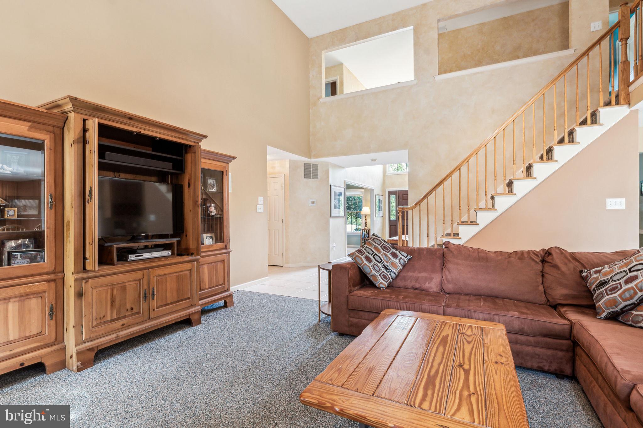 22 Devonshire Drive Voorhees, NJ 08043 - Photo 17 of 54 a living room with furniture and a flat screen tv