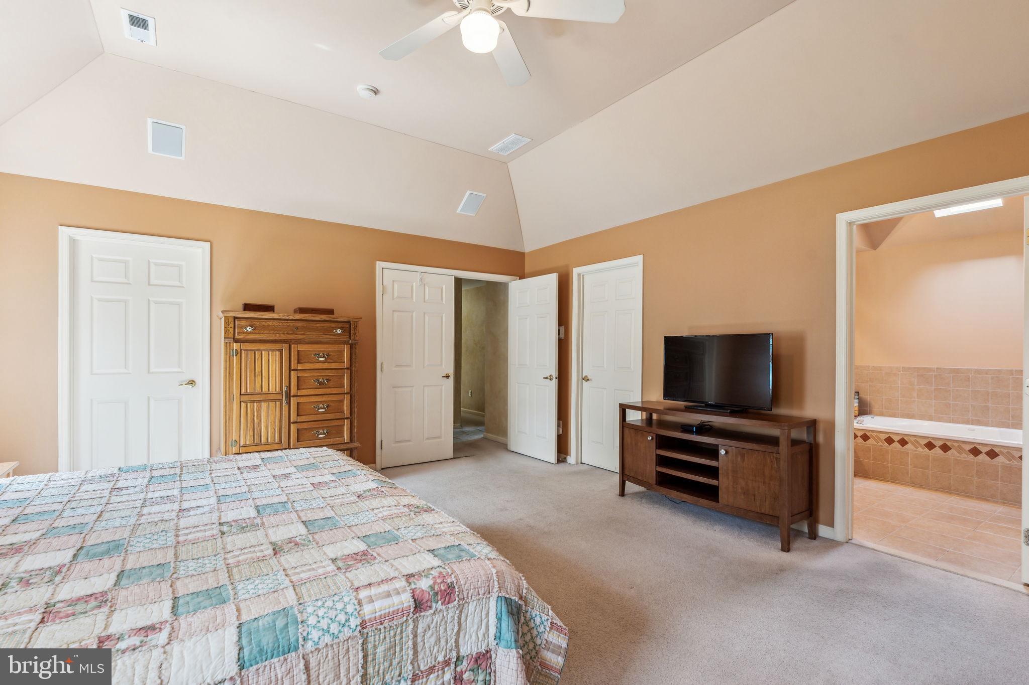 22 Devonshire Drive Voorhees, NJ 08043 - Photo 31 of 54 a bedroom with a bed and a flat screen tv