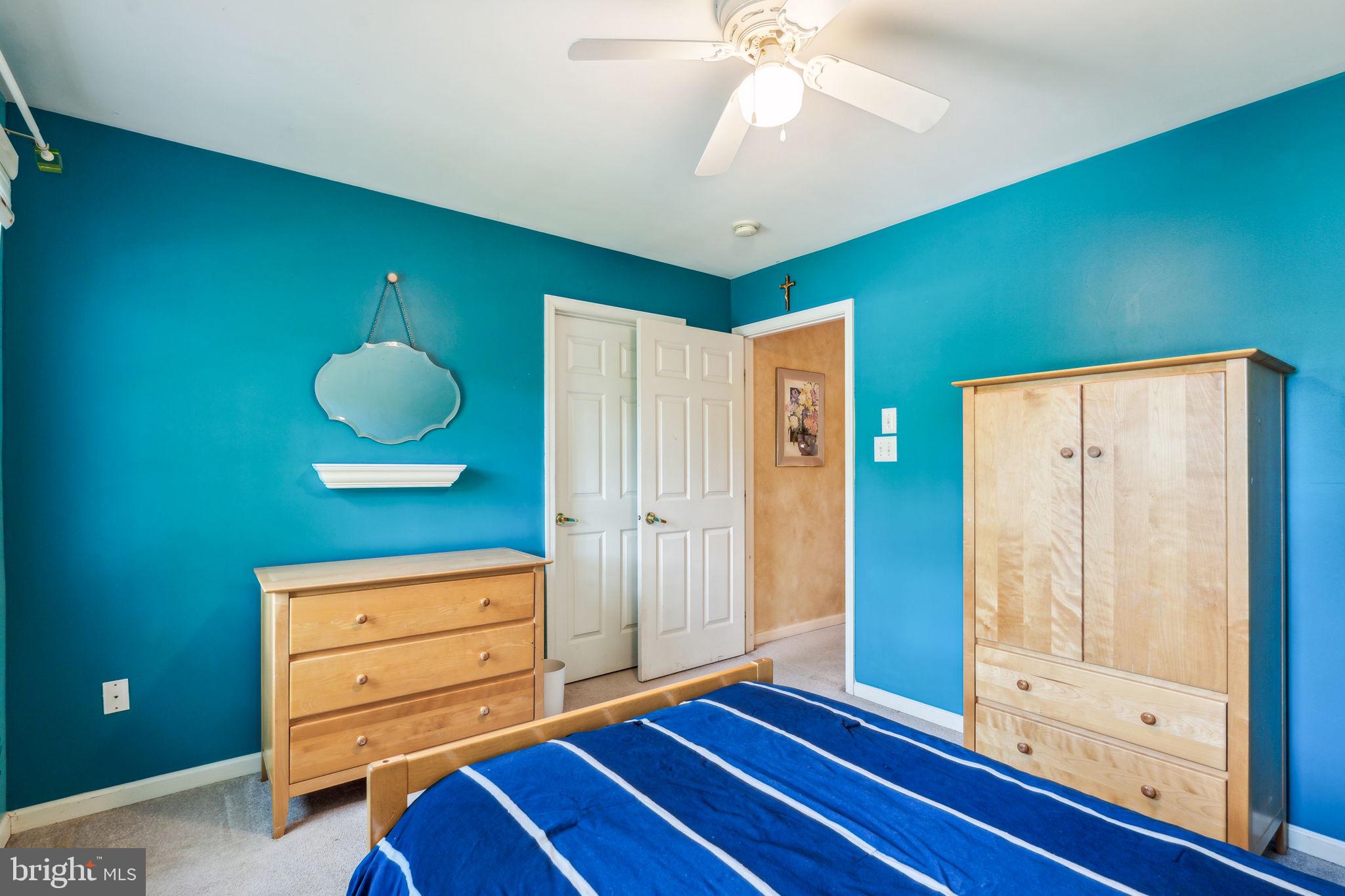 22 Devonshire Drive Voorhees, NJ 08043 - Photo 37 of 54 a view of room with cabinet and wooden floor