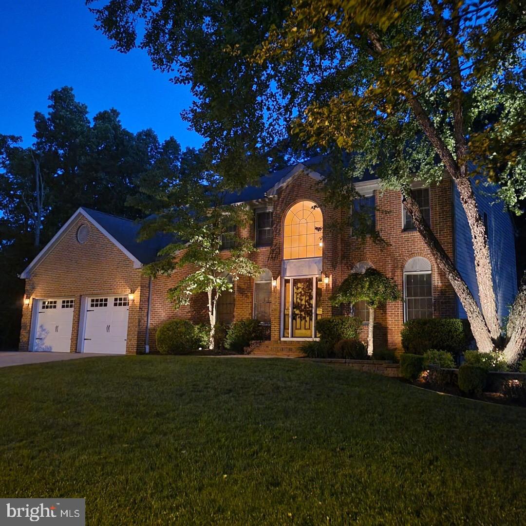 22 Devonshire Drive Voorhees, NJ 08043 - Photo 4 of 54 a front view of a house with a garden