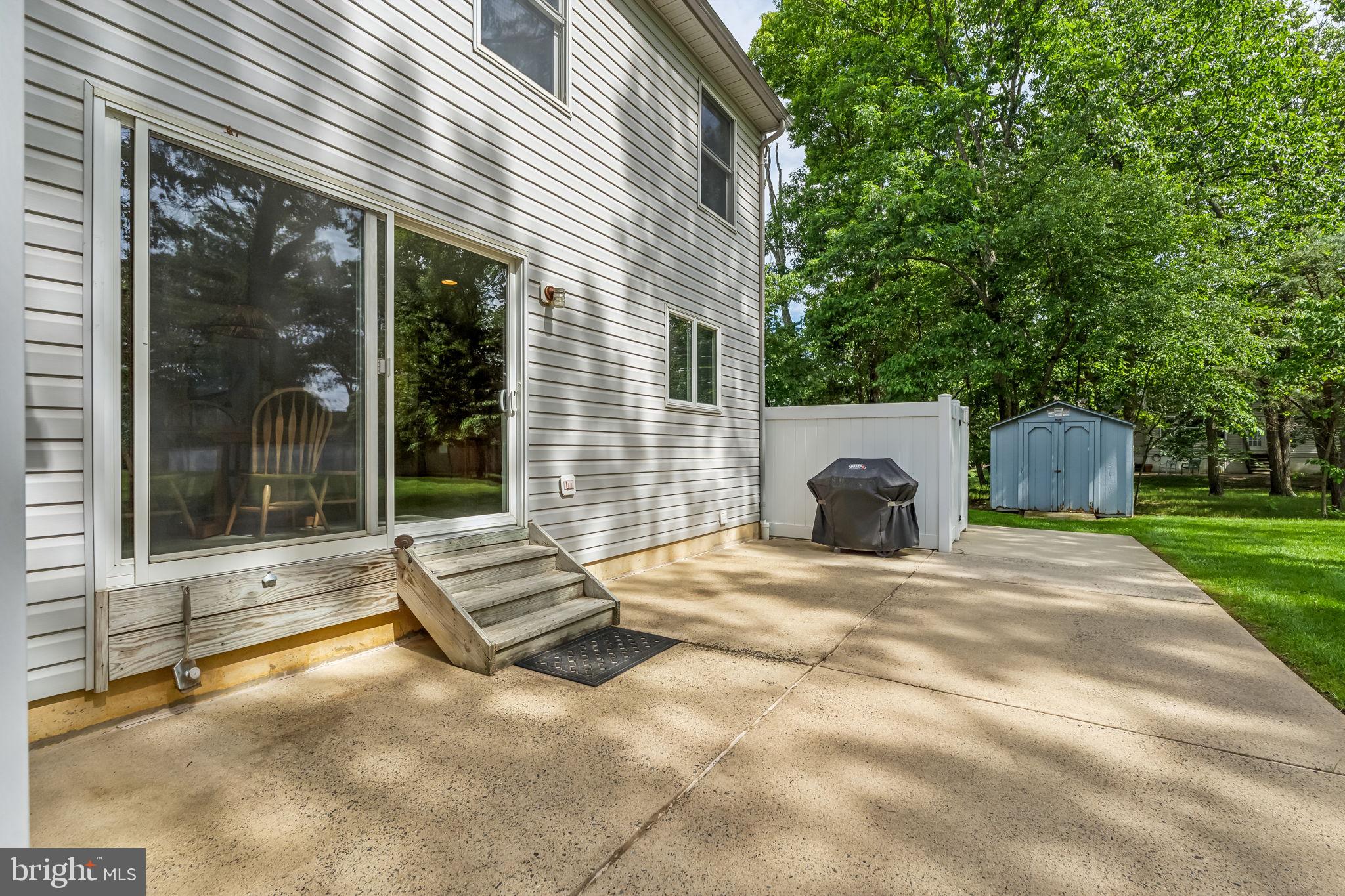 22 Devonshire Drive Voorhees, NJ 08043 - Photo 44 of 54 a view of a house with backyard and a garden