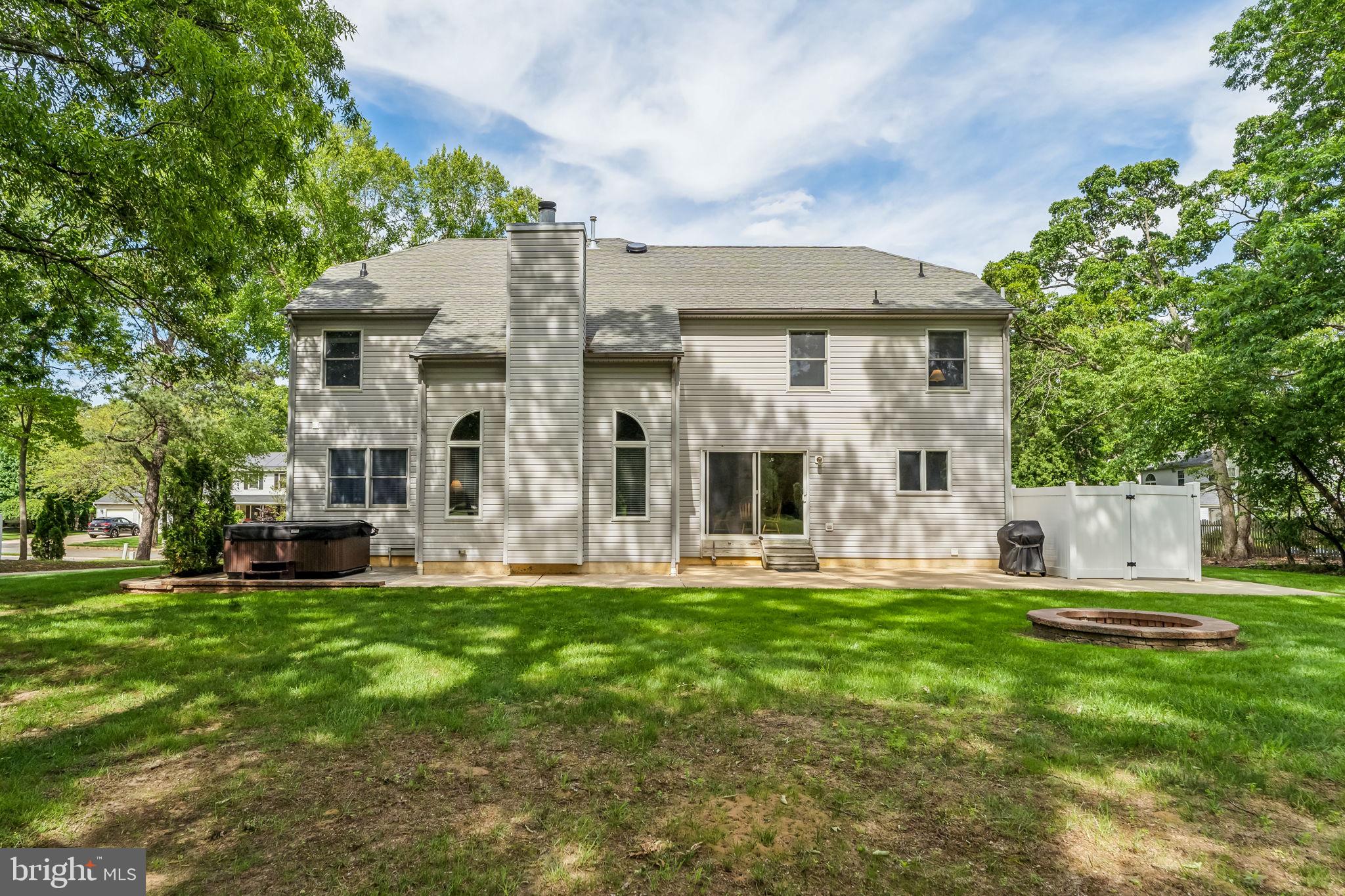 22 Devonshire Drive Voorhees, NJ 08043 - Photo 50 of 54 a large tree in front of a house