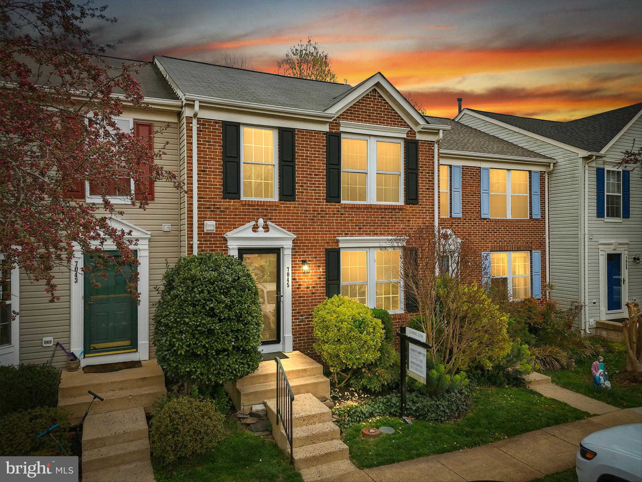 7045 Sauvage Lane Gainesville, VA 20155 - Photo 2 of 43 a front view of a house with garden