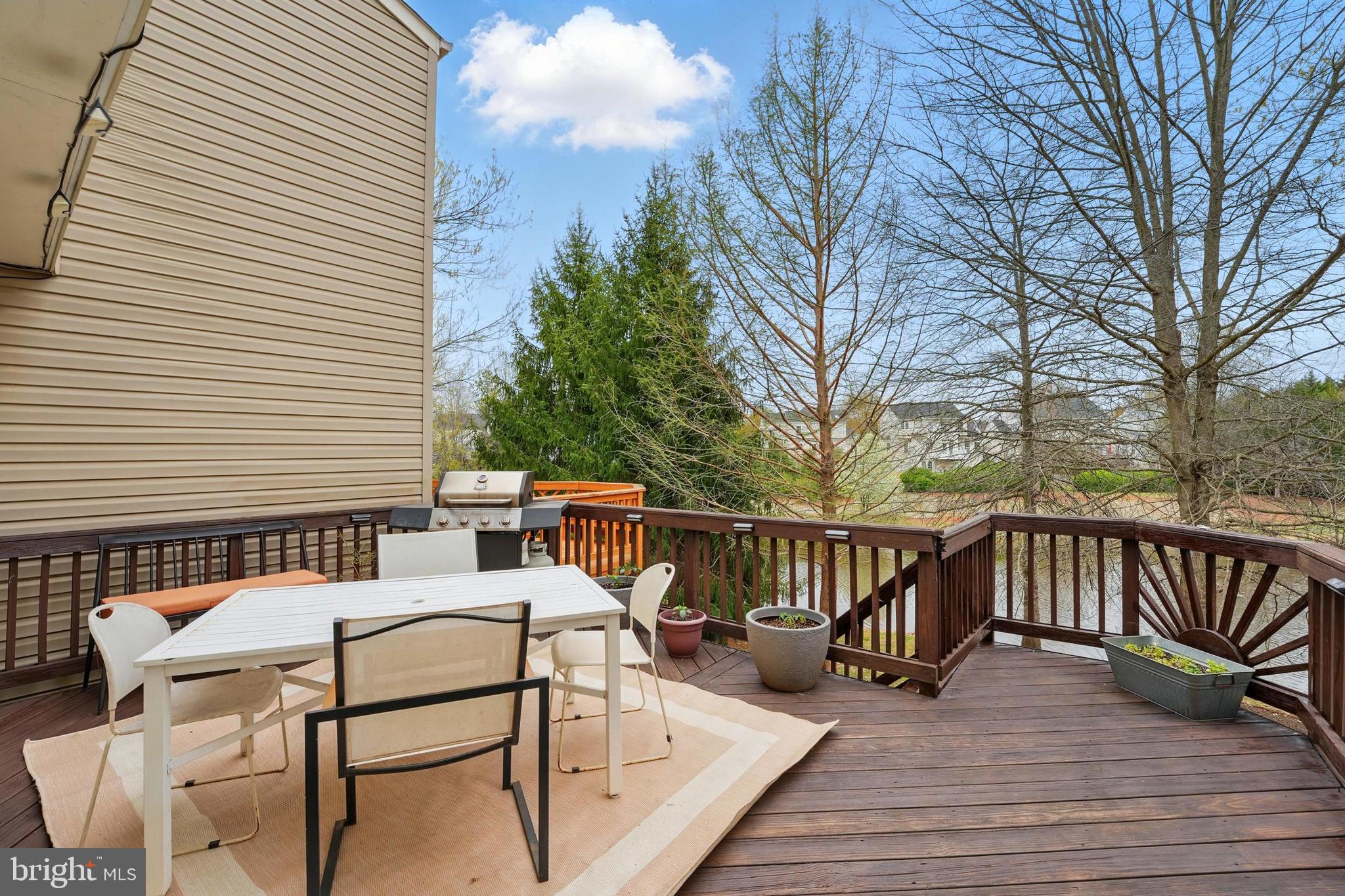 7045 Sauvage Lane Gainesville, VA 20155 - Photo 21 of 43 a view of a patio with a table and chairs