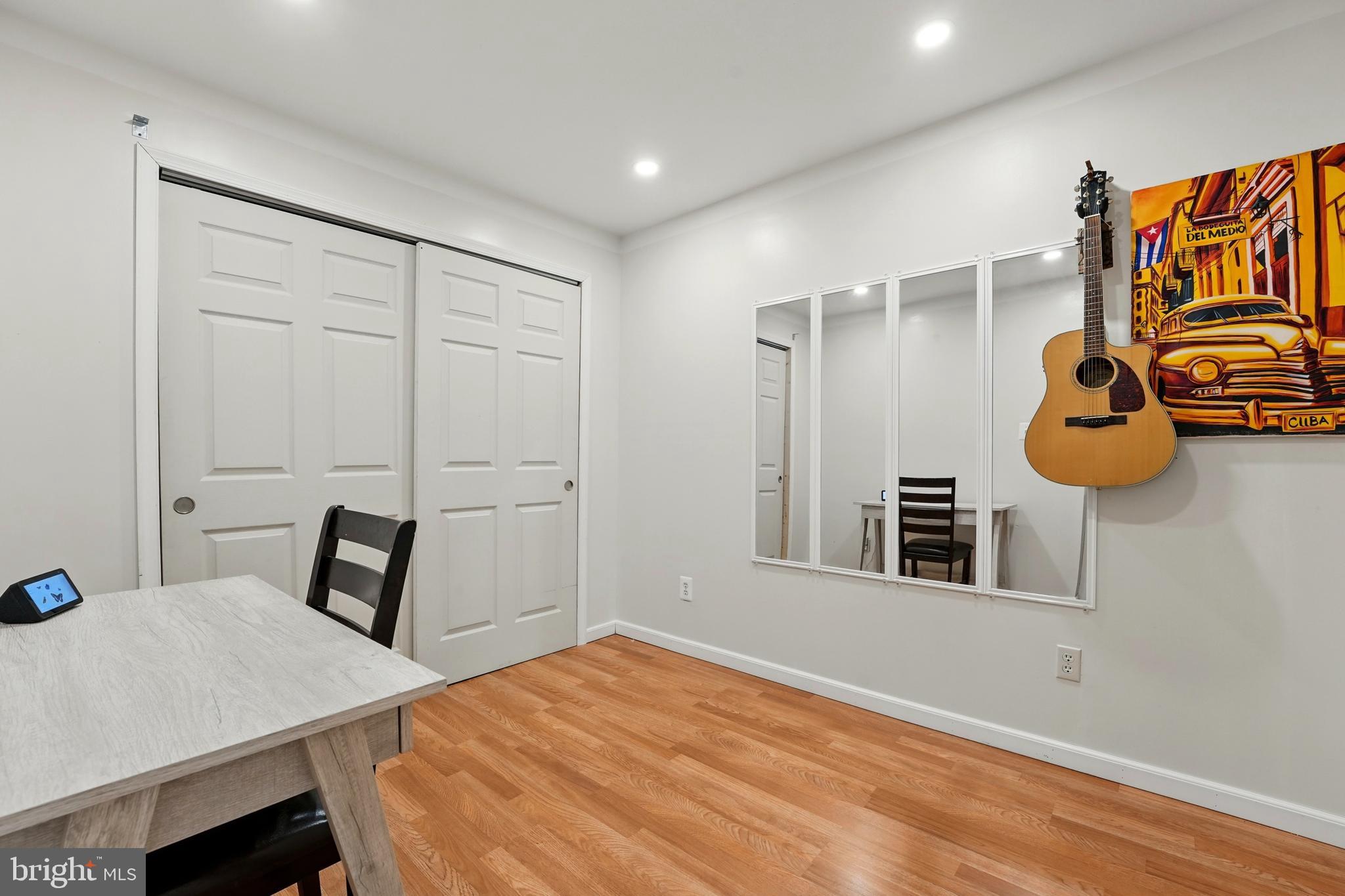 7045 Sauvage Lane Gainesville, VA 20155 - Photo 34 of 43 a bedroom with a bed and a table