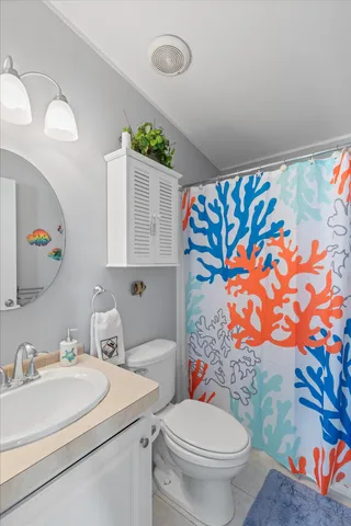 a view of a balcony dining table and chairs