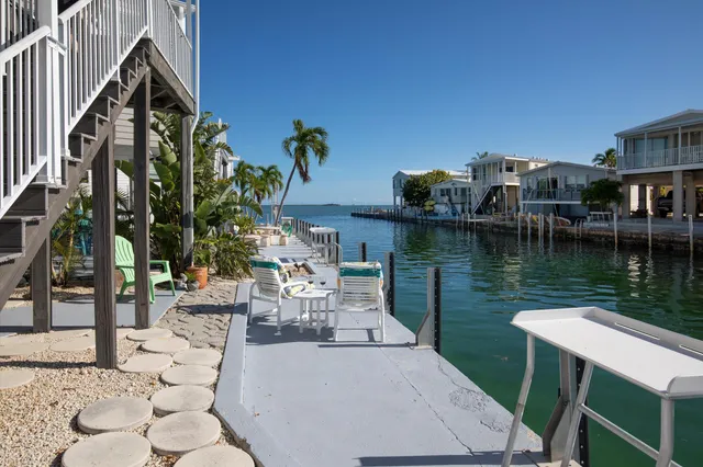 an aerial view of a house with a garden view