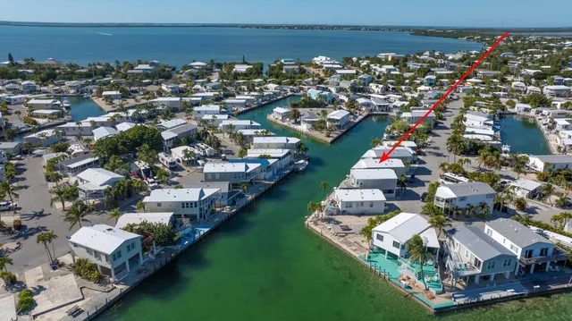 an aerial view of a house with outdoor space