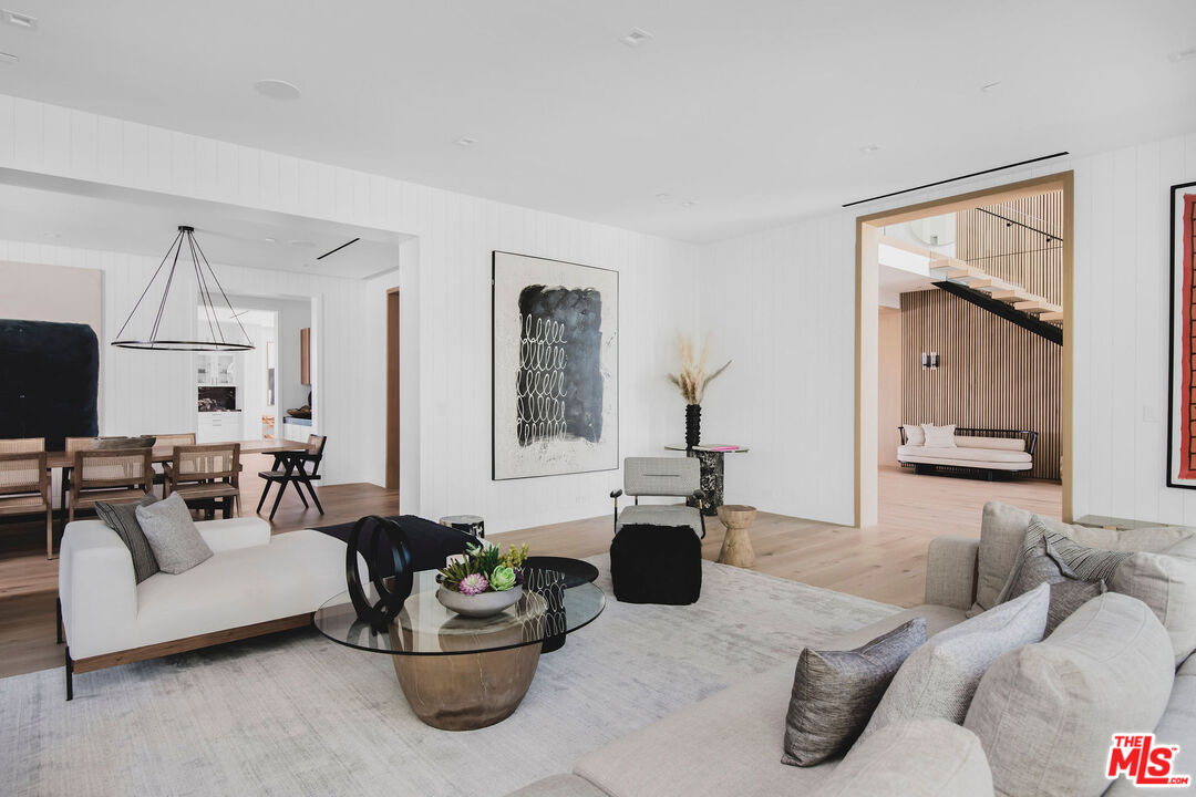 5505 Hoback Glen Road Hidden Hills, CA 91302 - Photo 12 of 43 a living room with furniture and a potted plant