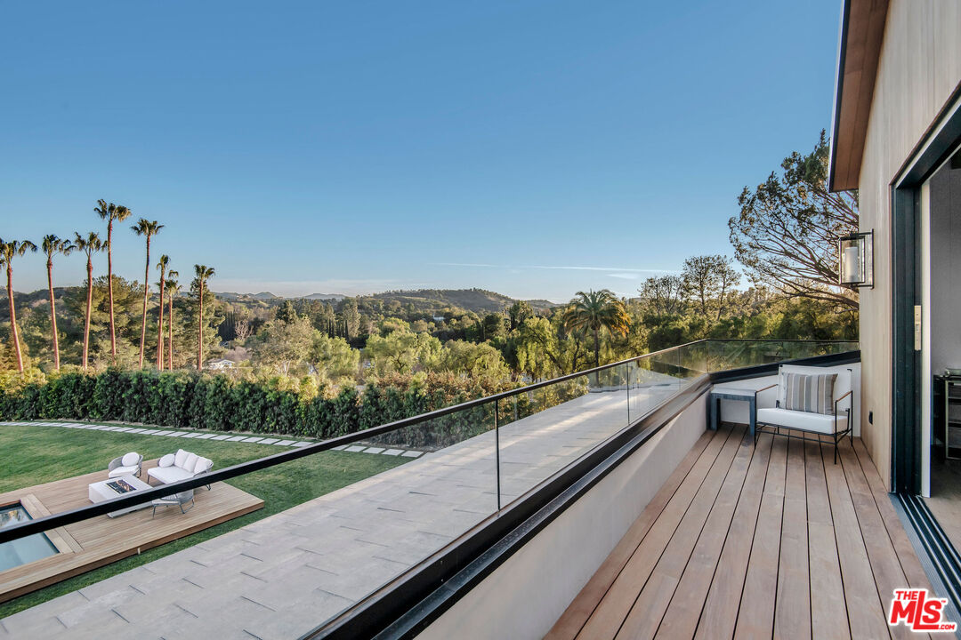 5505 Hoback Glen Road Hidden Hills, CA 91302 - Photo 30 of 43 a view of a balcony with chairs