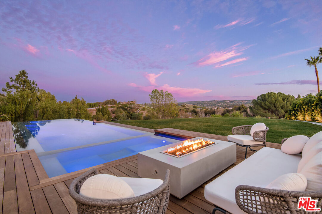 5505 Hoback Glen Road Hidden Hills, CA 91302 - Photo 42 of 43 a view of swimming pool and outdoor seating