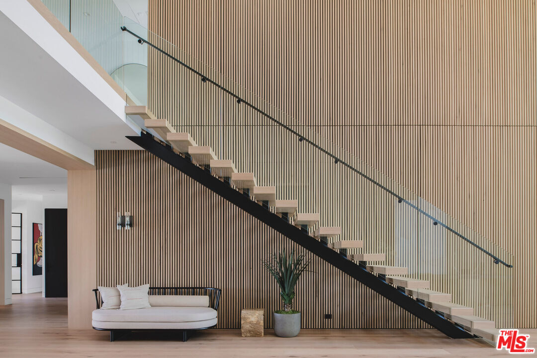 5505 Hoback Glen Road Hidden Hills, CA 91302 - Photo 7 of 43 a view of entryway and hall with wooden floor
