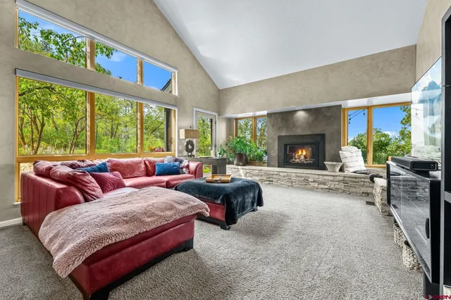 a view of a living room and dining room