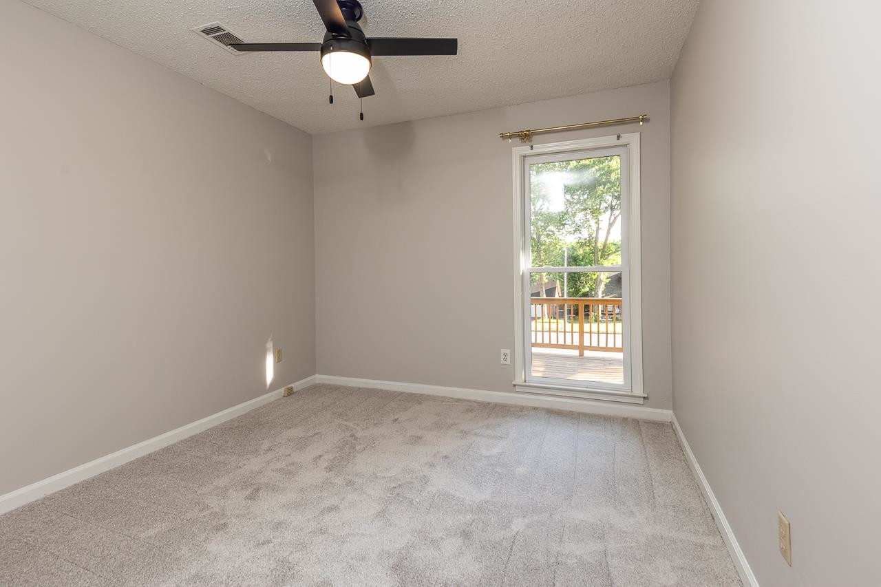 8364 Bazemore Road Cordova, TN 38018 - Photo 25 of 33 an empty room with a window