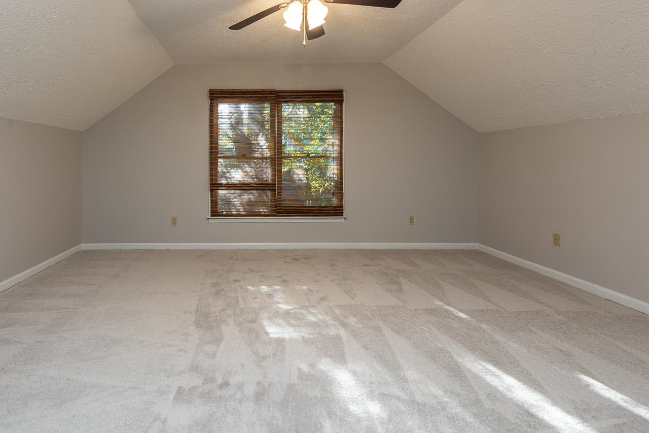 8364 Bazemore Road Cordova, TN 38018 - Photo 29 of 33 an empty room with a empty space and windows