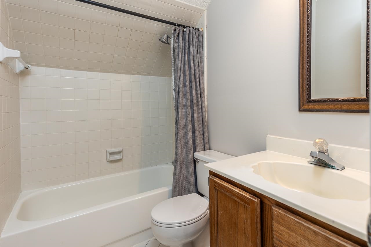 8364 Bazemore Road Cordova, TN 38018 - Photo 30 of 33 a bathroom with a sink a toilet and a bathtub