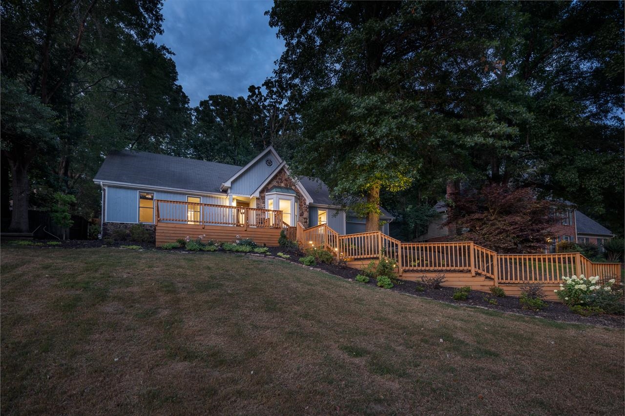 8364 Bazemore Road Cordova, TN 38018 - Photo 4 of 33 a front view of a house with garden