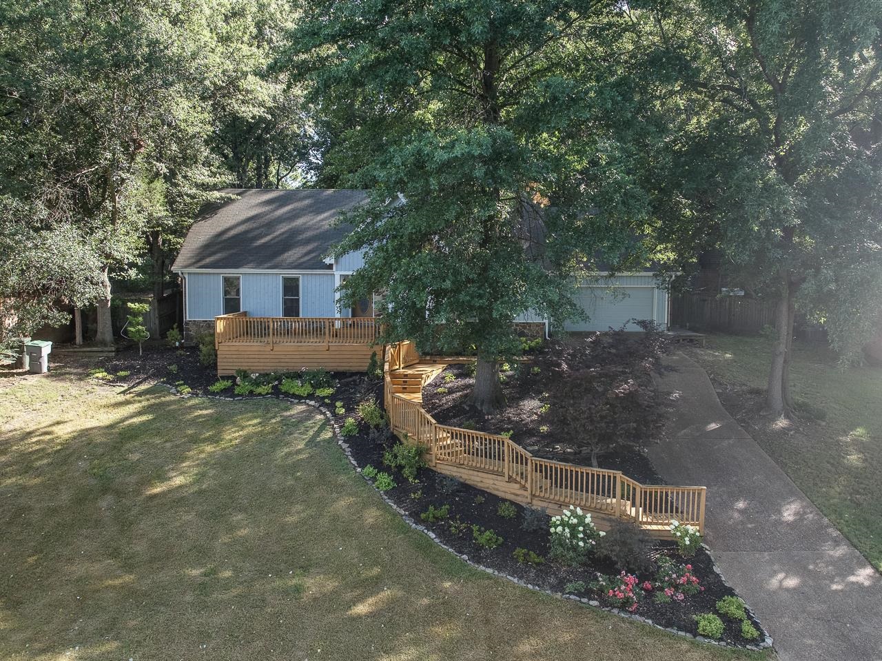 8364 Bazemore Road Cordova, TN 38018 - Photo 7 of 33 a view of a house with a yard