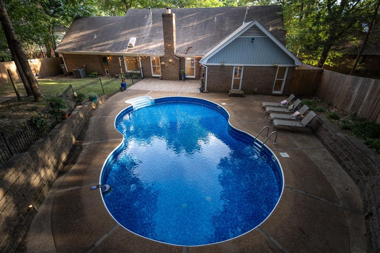 8364 Bazemore Road Cordova, TN 38018 - Photo 8 of 33 a view of a house with backyard