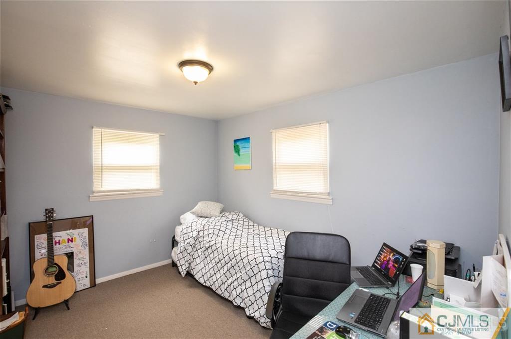 19 Eardley Road Edison, NJ 08817 - Photo 16 of 25 a bedroom with bed and a window