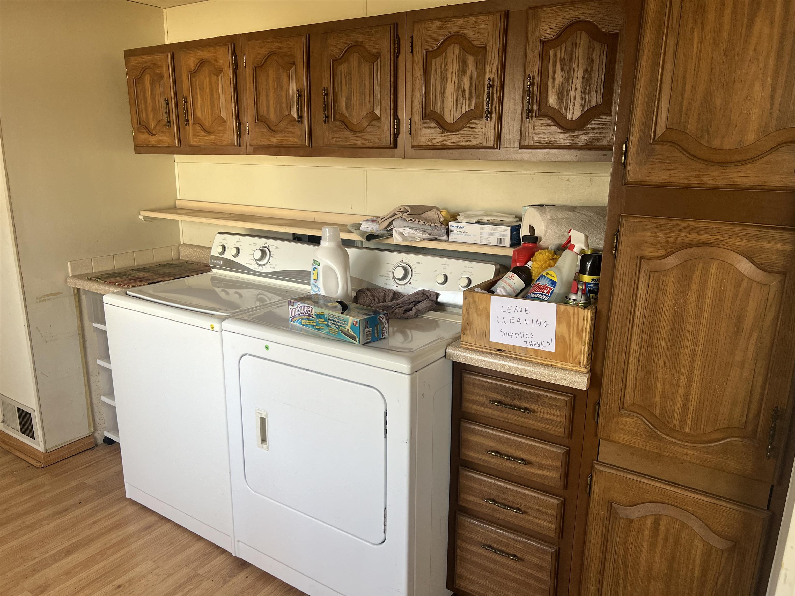 8282 North Afolkey Road Dakota, IL 61018 - Photo 12 of 42 a utility room with dryer and washer