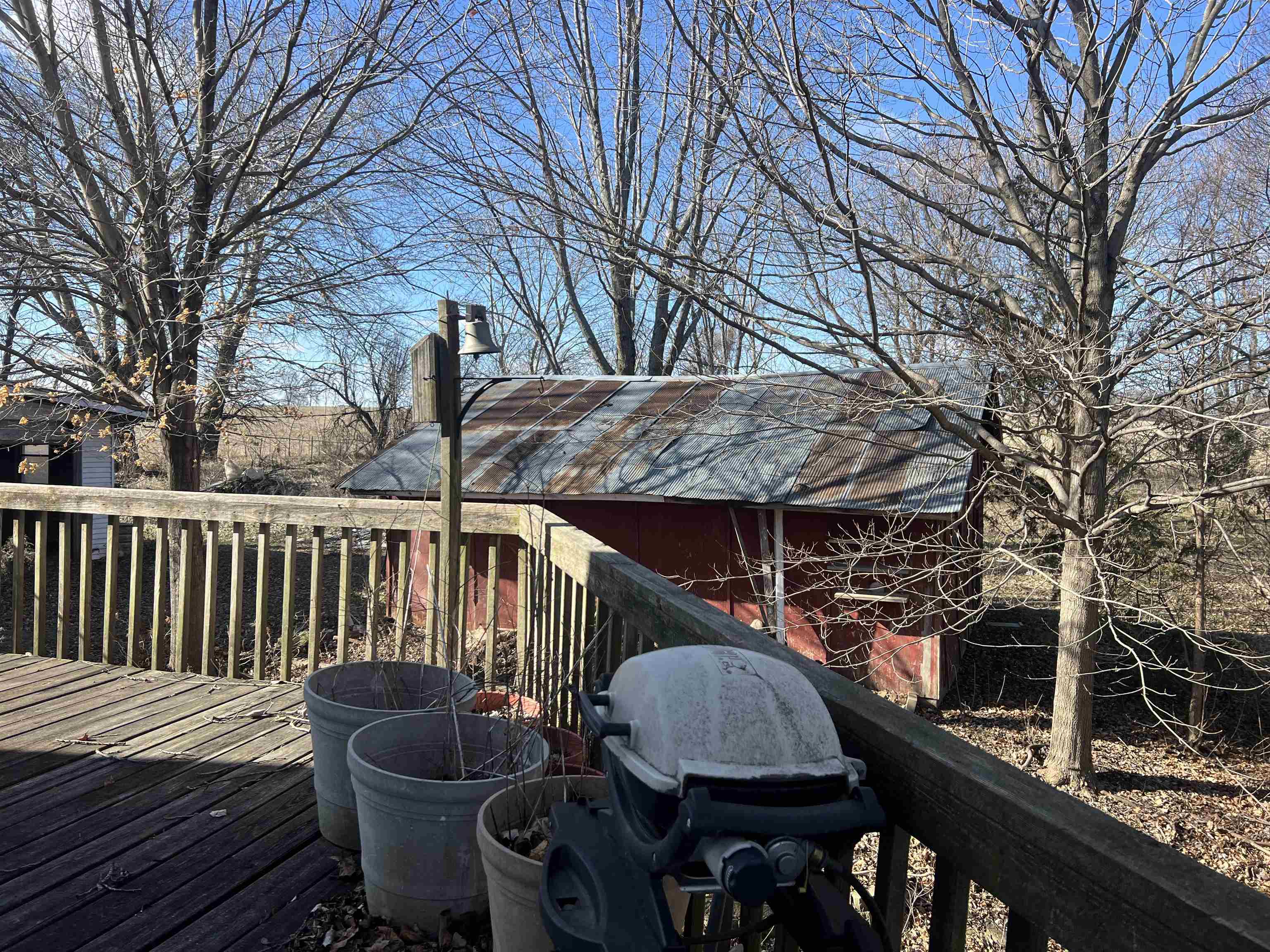 8282 North Afolkey Road Dakota, IL 61018 - Photo 36 of 42 a view of a chairs and table in the balcony