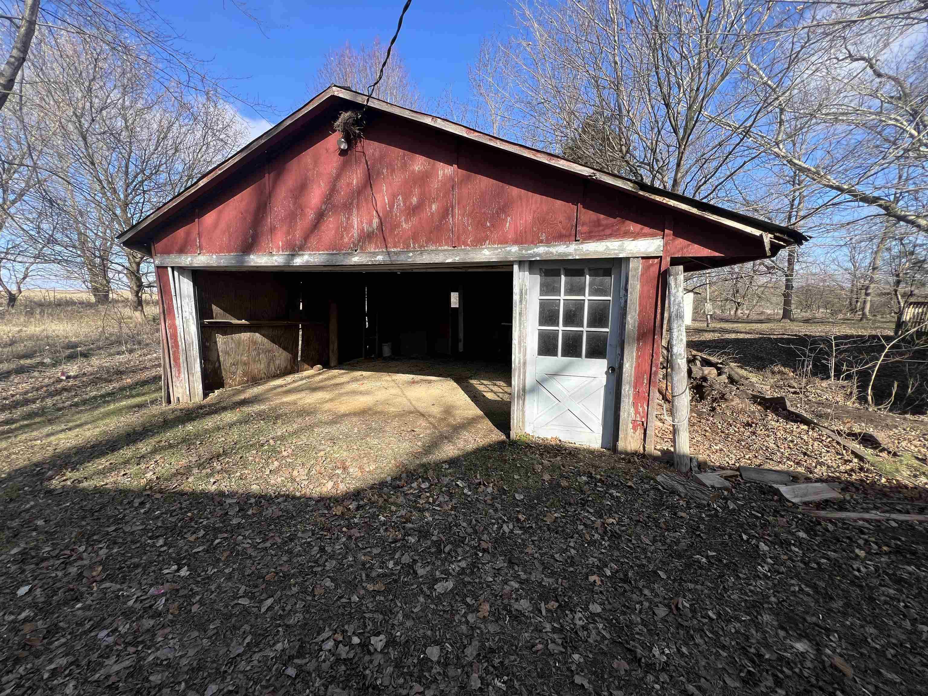 8282 North Afolkey Road Dakota, IL 61018 - Photo 39 of 42 a view of a house with backyard and porch